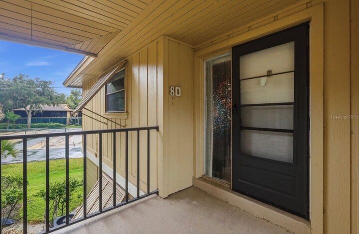 Property Photo:  130 Jasmine Woods Court 8D  FL 32725 