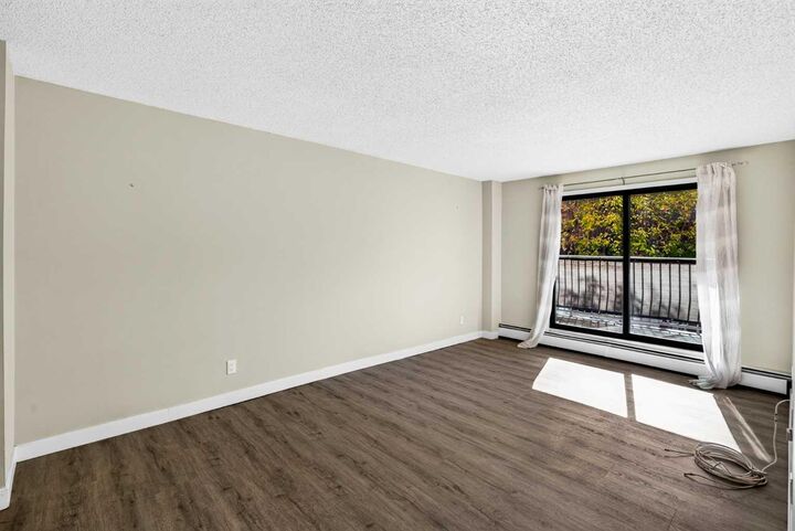 Property Photo:  835 19 Avenue SW 105  AB T2T 0H6 