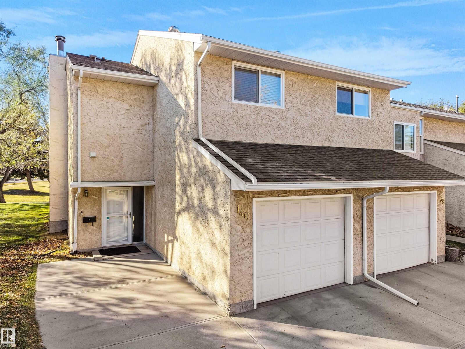Property Photo: 140 Callingwood Place NW AB T5T 2C6