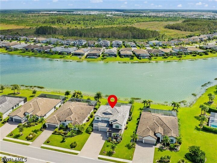 Property Photo:  19390 The Place Boulevard  FL 33928 