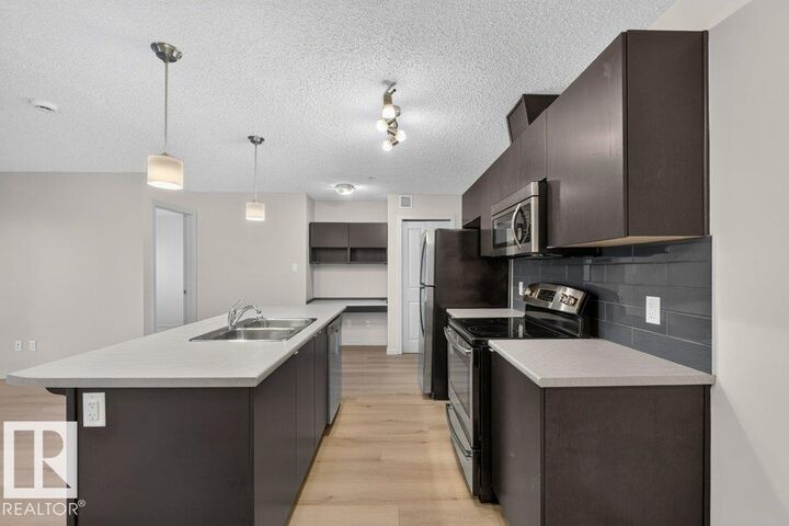 Property Photo:  508 Albany Way NW 103  AB T6V 0L1 