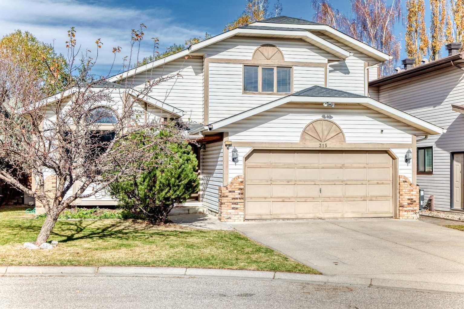 Property Photo:  315 Wood Valley Bay SW  AB T2W 5Y5 