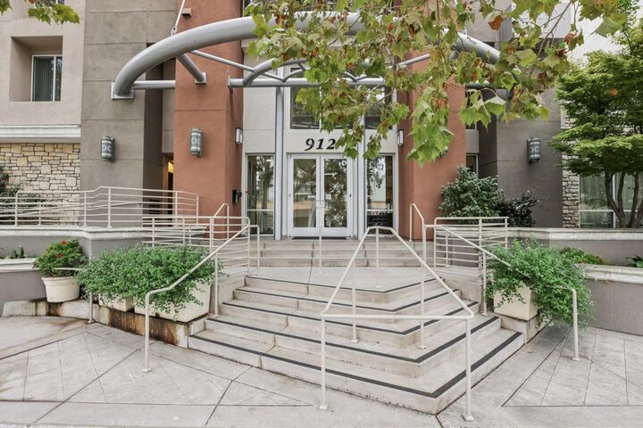 Property Photo:  912 Campisi Way 407  CA 95008 