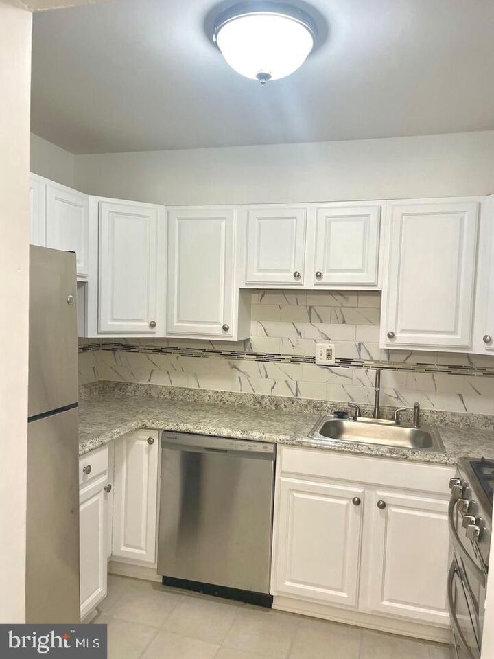 Property Photo:  3807 Swann Road 101  MD 20746 
