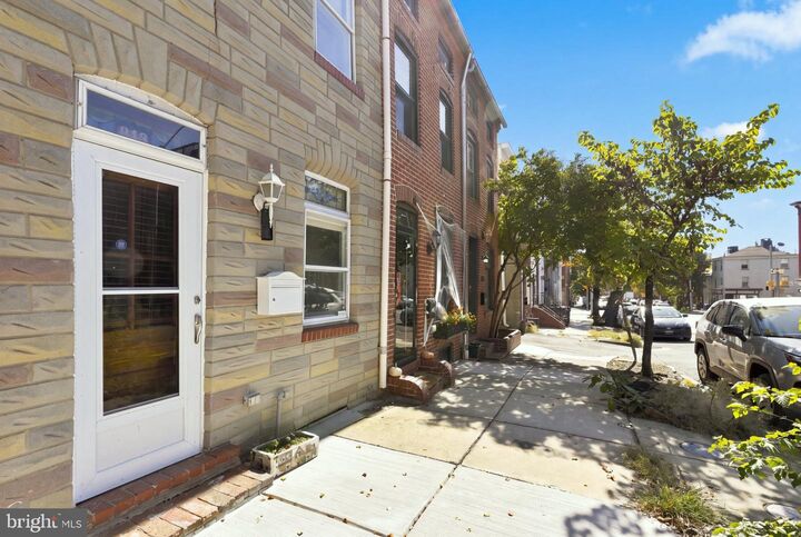 Property Photo: 313 S Washington Street MD 21231