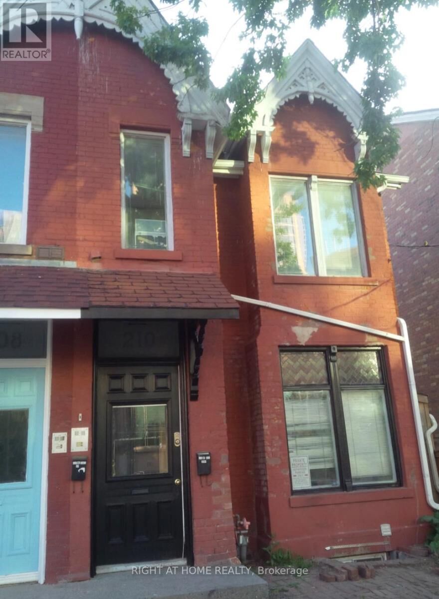 Property Photo: 210 McCaul Street B ON M5T 1W5