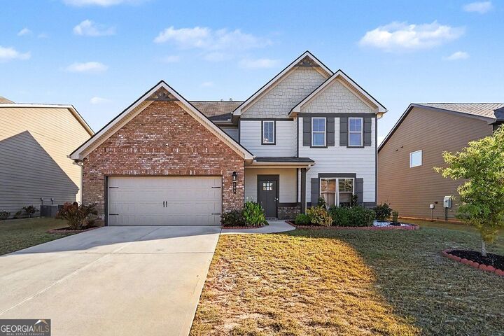 Property Photo:  305 Eleanora Crossing  GA 30052 