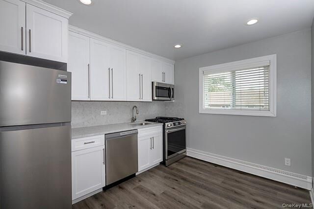 Property Photo:  100 Friendly Court Fc67  NY 11704 