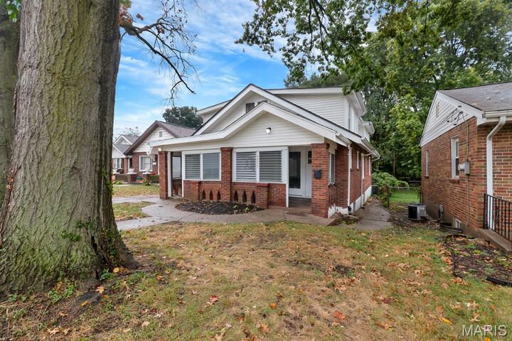 Property Photo:  9022 Midland Boulevard  MO 63114 