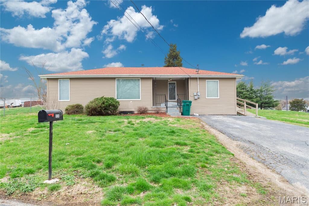 Property Photo:  936 Guenzler Drive  MO 63052 
