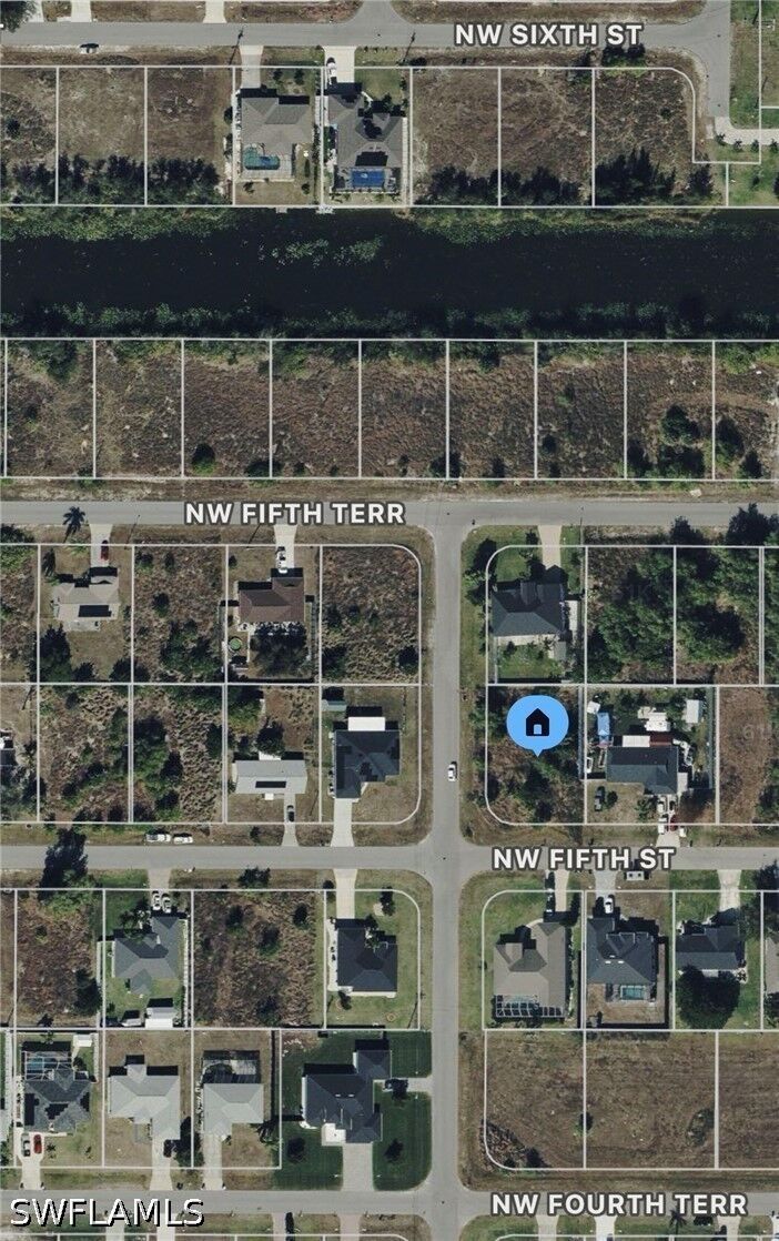 Property Photo:  325 NW 5th Street  FL 33993 