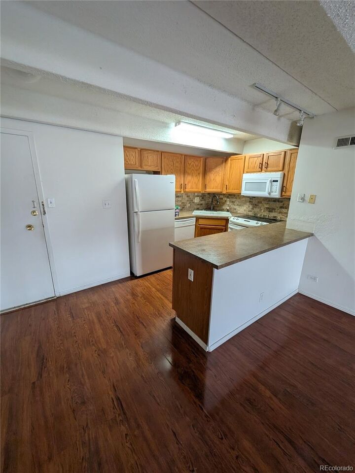 Property Photo:  8060 Girard Avenue 220  CO 80231 