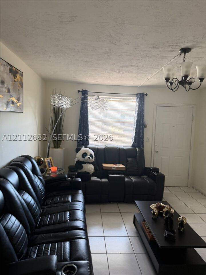 Property Photo:  1655 W 44th Pl 435  FL 33012 