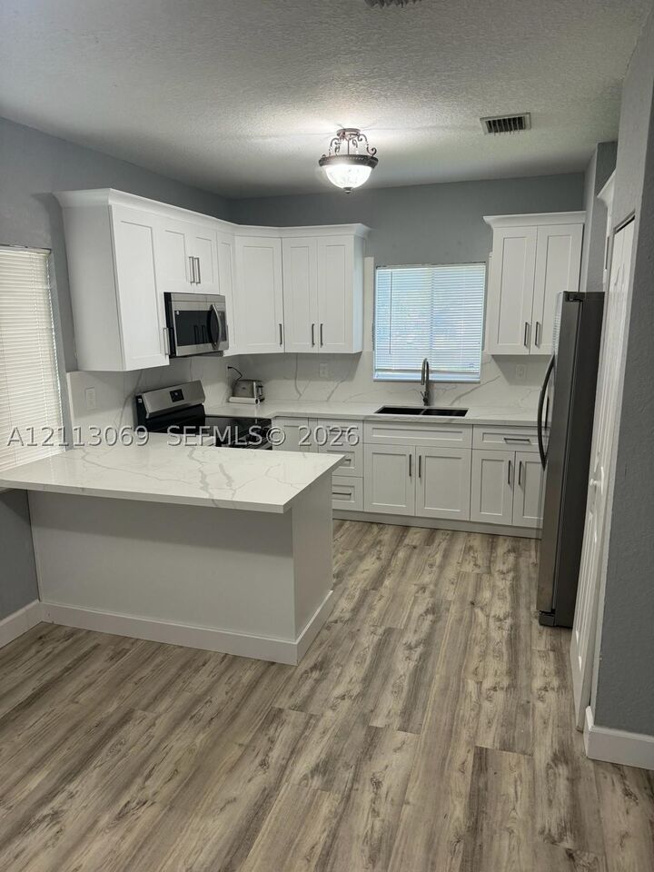 Property Photo:  2270 NW 51st Ter  FL 33142 
