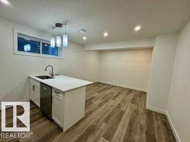 Property Photo:  22120 80 Avenue NW Bsmt  AB T5T 7R6 