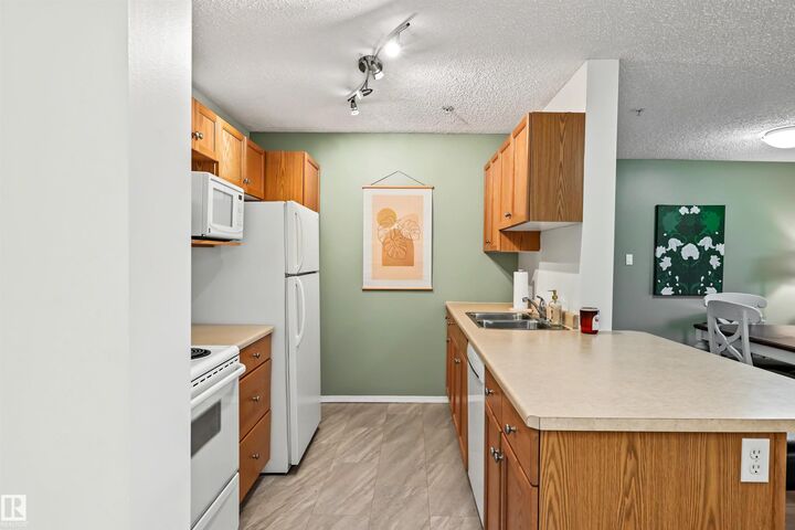 Property Photo:  10511 42 Avenue NW 109  AB T6J 7G8 