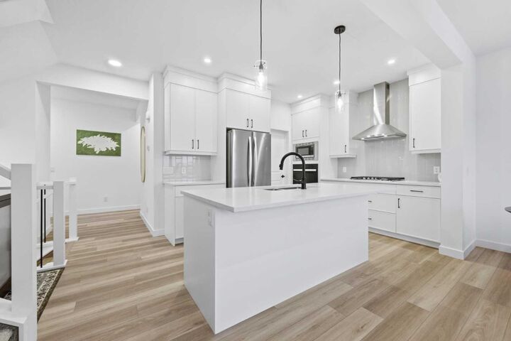 Property Photo: 680 Creekstone Circle SW AB T2X 4Y6