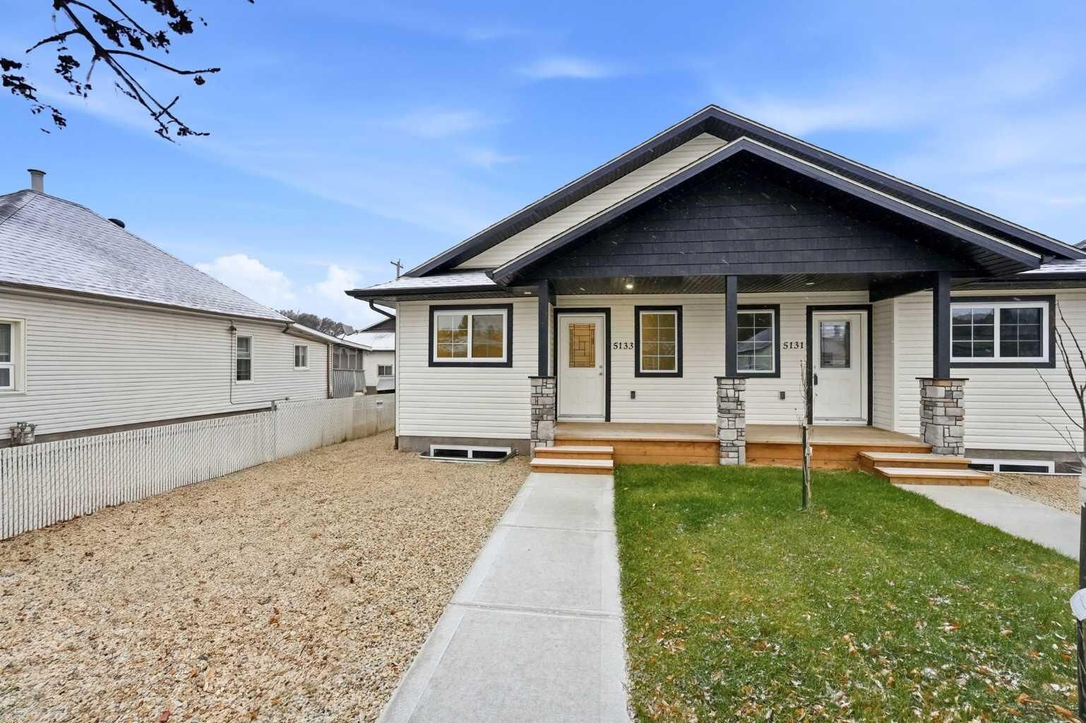 Property Photo: 5133 52 Street AB T4L 1H9