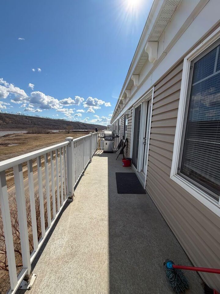 Property Photo:  10217 Queen Street 404  AB T9H 5S5 