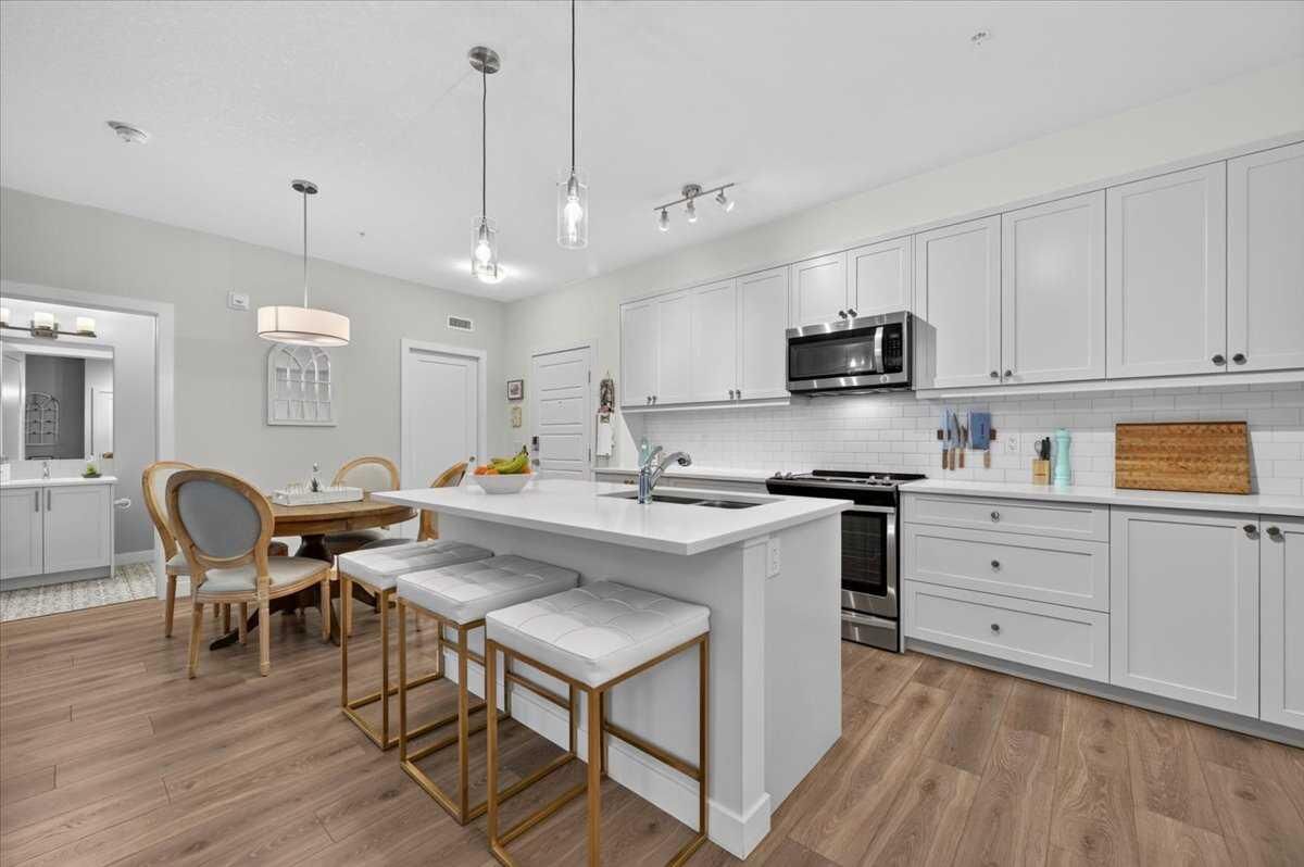 Property Photo:  100 Auburn Meadows Manor SE 116  AB T3M 3H2 