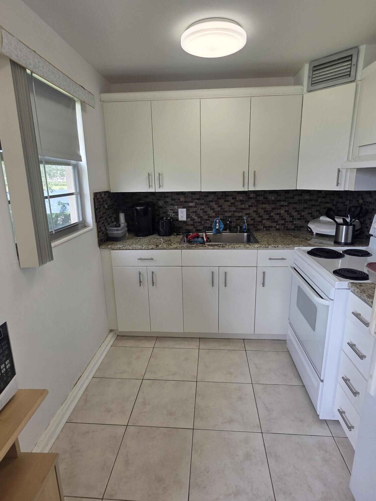 Property Photo:  241 Southampton C  FL 33417 