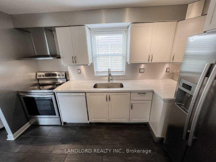 Property Photo:  220 Ellington Drive Main  ON M1R 3Y4 