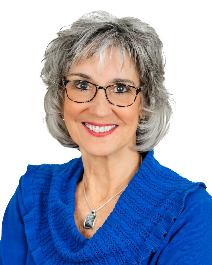 Luanne Jones,  in Anderson, Caine