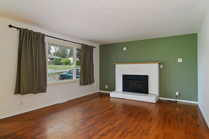 Property Photo: Living room/dining room/kitchen/sun room 20136 14th Ave S WA 98198
