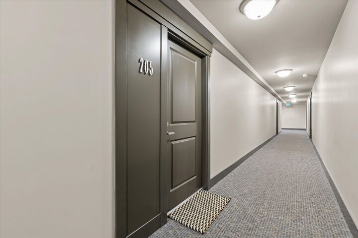 Property Photo:  22910  90th Avenue W E205  WA 98026 