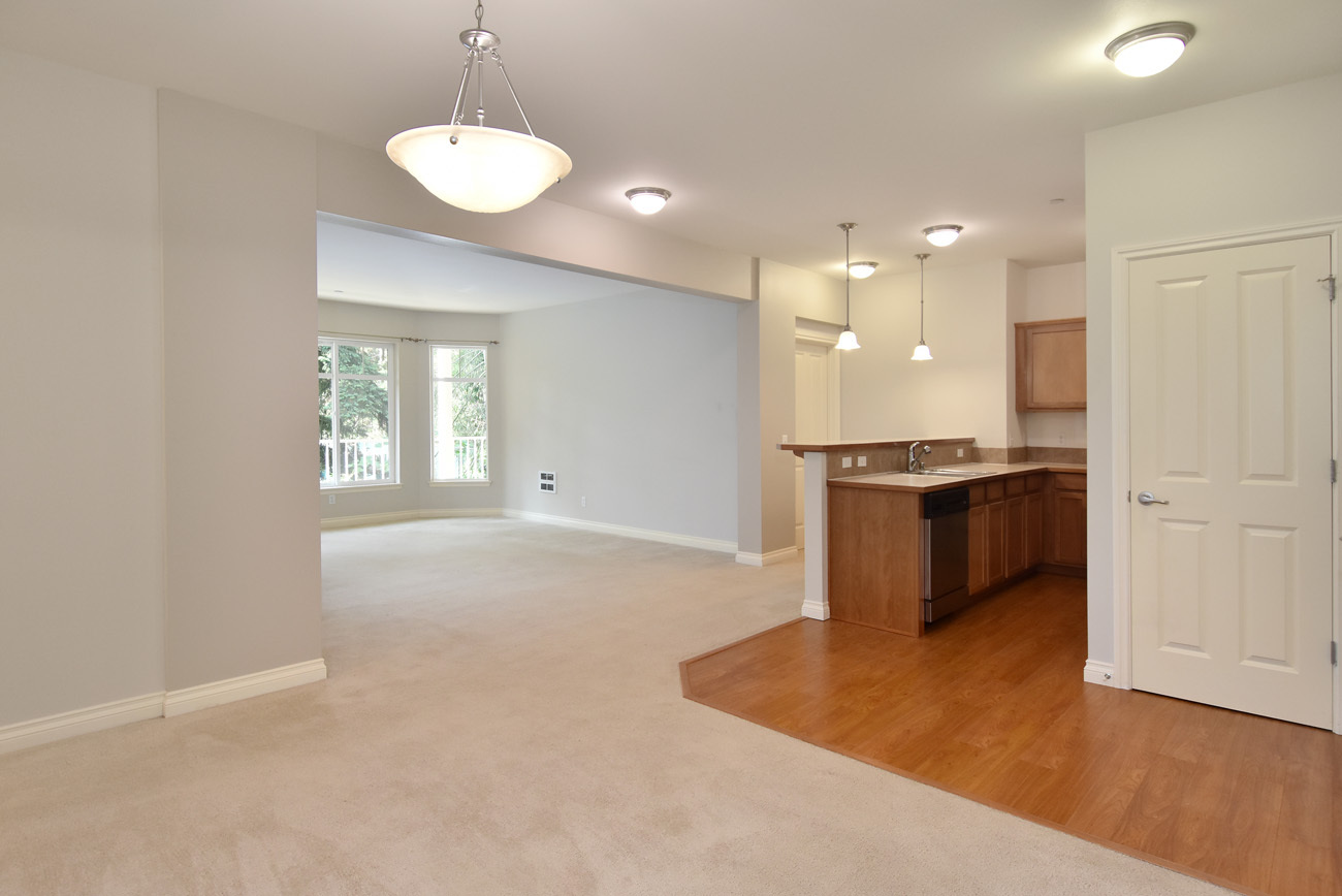 Property Photo: Dining room & kitchen 20028 15th Ave NE 103  WA 98155 