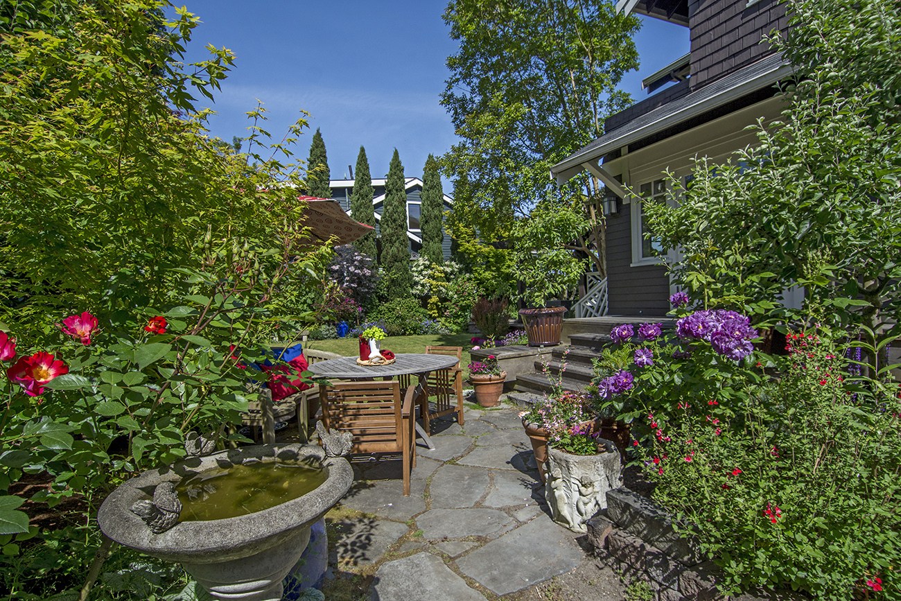 Property Photo: Backyard, Patio & Deck 1635 11th Ave W  WA 98119 