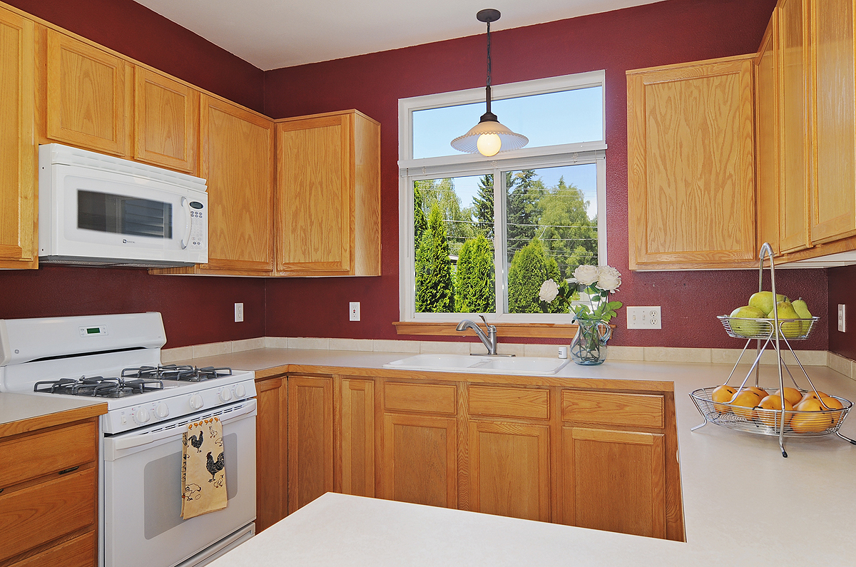 Property Photo: Living room, dining room, kitchen & bathroom 11326 25th Ave NE D  WA 98125 